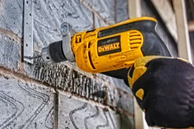 Сетевая ударная дрель DeWalt DWD024K